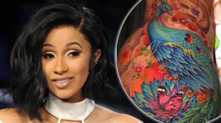 Cardi B shocks fans with epic peacock tattoo in before and after photos
