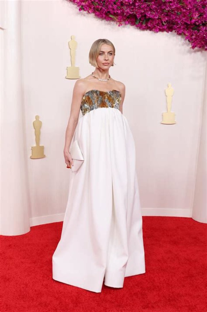 Julianne Hough Wows on the Oscars 2024 Red Carpet in a Unique White Jumpsuit and Heels [Photos]